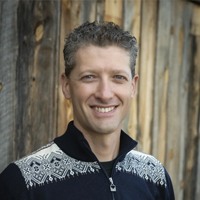 A headshot of Dr. Isaac Mooberry, a chiropractor at The Wellness Way South Denver.