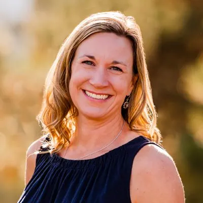 A headshot of Dr. Katy-Mooberry, a chiropractor at The Wellness Way South Denver.